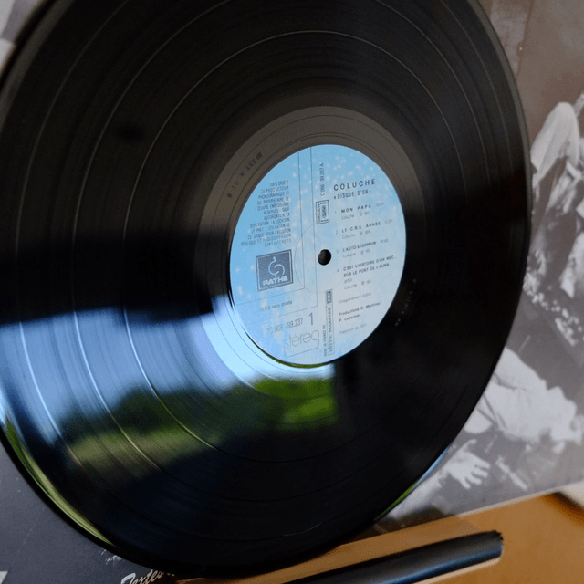 COLUCHE - Disque d'or