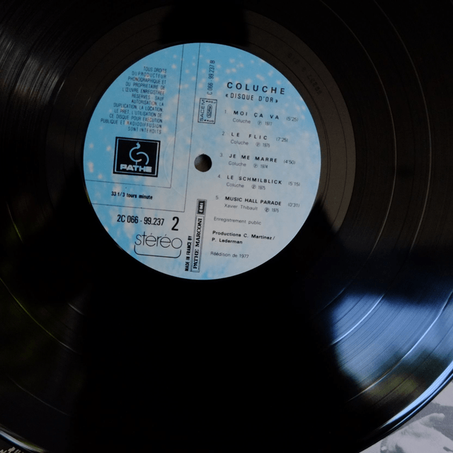 COLUCHE - Disque d'or